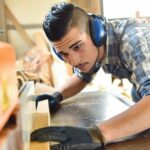 Young_man_in_woodwork_training_course