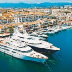 Aerial_top_view_of_luxury_yachts_in_Puerto_Banus_marina,_Marbella,_Spain._High_quality_photo