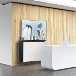 Empty_office,_white_reception_at_wooden_wall._Panoramic_window_right,_meeting_room_behind._New_York._Concept_of_reception._3D_rendering