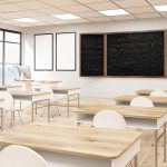 Business_University_classroom_interior._Blackboard_and_posters_on_wall,_wooden_desks_and_plastic_chairs._Concept_of_obtaining_knowledge._Back_to_school._3d_rendering._Mock_up