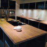 Modern_clean_design_trendy_kitchen_with_black_wooden_elements_